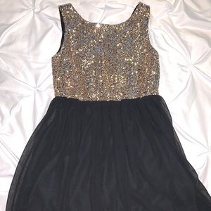 Gold sequin and black dress